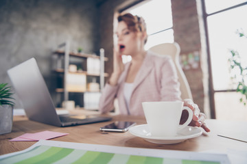 Portrait of blurred nice attractive tired lady executive professional auditor bookkeeper planning income yawning insomnia syndrome at modern industrial brick loft style interior work place station