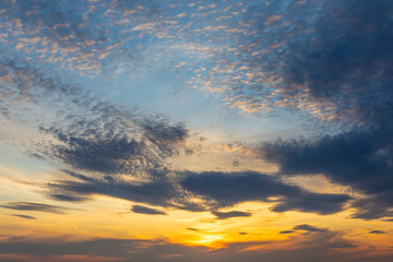 Naklejka na ściany i meble dramatic sky with many little clouds before the sunset