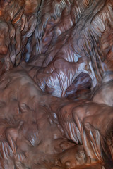 The texture of the cave in digital processing as an oil painting. Smooth texture. Flowing shapes.