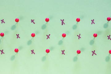 Pushpins and crosses. Social distancing concept