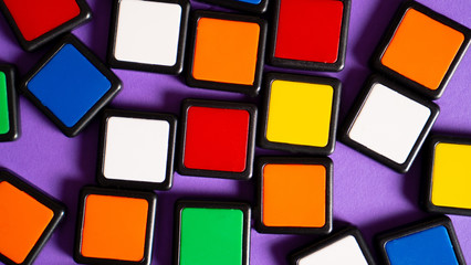 Scattered colorful squares as background. Backdrop for smart and educational games. Kid's imagination concept.