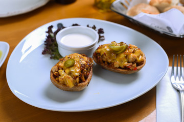 Snack with potato wedges, chicken and cheddar