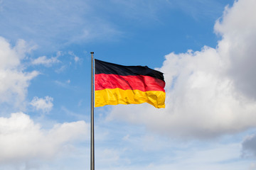 Germany flag closeup in wind. red, black and yellow colors.