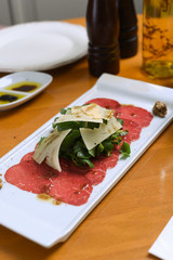 Protein and delicious veal beef with cheese, greens decoration