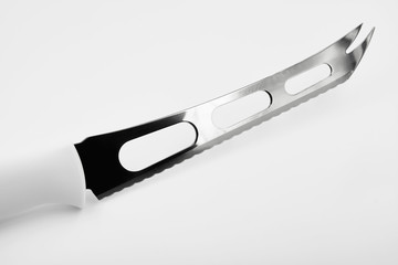 Cheese knife on white background