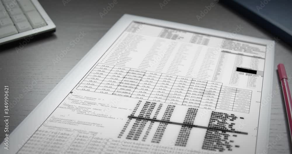 Poster sheet of white paper with digitally animated numbers and code lies on an office table. futuristic wo