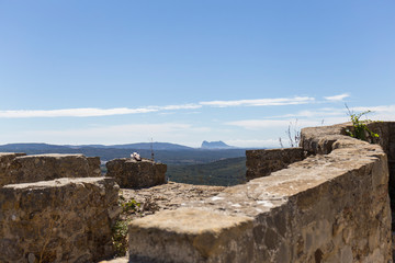 stone castle wall overlooking the horizon, Castellar de la Frontera Cádiz