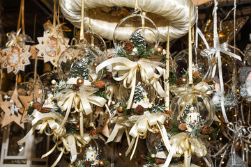 Christmas tree ornament decoration red ribbons and cute little angels for hanging in the tree
