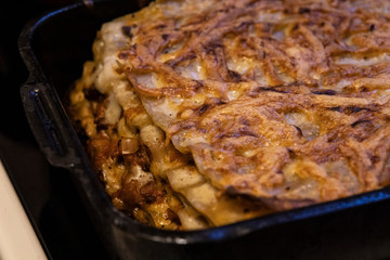 Cooked lasagna in pan for oven. Italian home cooking