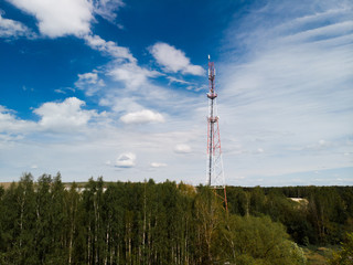 4G and 5G GSM telecommunications tower with blue sky background