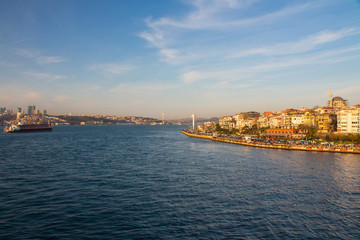 Fototapeta na wymiar View of the Uskudar district of Istanbul from the Bosphorus at sunset. Turkey