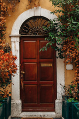 Fototapeta na wymiar Old wooden doors. Exterior. European city