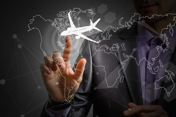 businessman touch plane connect to plan world map