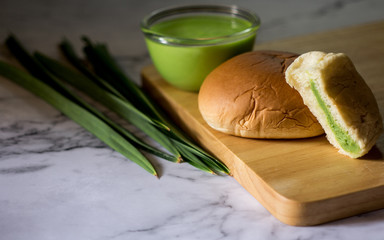 Fusion food of bakery and Thai dessert. Pandan Custard Bread. Soft bread home made. Sweet and good smell