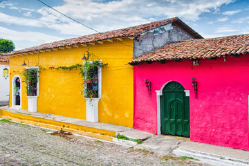 Colorful bright yellow building in Suchitoto, El Salvador  Suchitoto is located close to the...