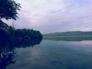 cloudy day at the lake. water reflecting clouds