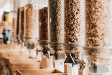 Eco-friendly zero waste shop. Dispensers for cereals, nuts and grains in sustainable plastic free...