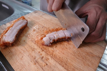 traditional Thai culture air fryer fried pork cuisine style or moo tod krob favorite famous street fast foods menu at thailand homemade
with hot spicy sauces on table wood dish sticky rice vegetable