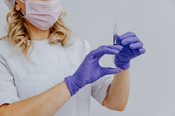 syringe, doctor, medicine, medical, nurse, injection, healthcare, hand, needle, woman, hospital, health, mask, care, vaccine, vaccination, glove, gloves, white, clinic, isolated, professional, laborat