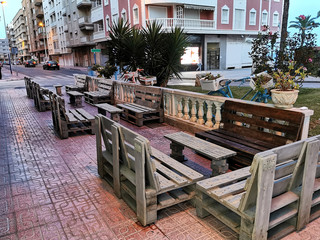 
tables in an outdoor cafe, outdoor terrace, empty tables social distance, coronavirus, epidemic