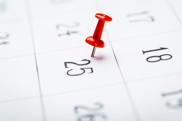 2020 calendar page marked with an important date in red pin. timeline, time, concept, idea,...