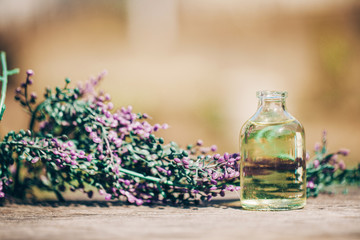 Obraz na płótnie Canvas lavender essential oil. Oil spa. Flowers background. 