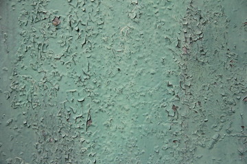 background green rusty wall spliced with corrosion