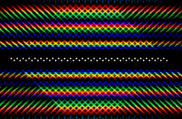 Photograph of a diffraction pattern from a double line of LEDs. Image was obtained using a twin  diffraction grating. Beautiful play of light from intersecting brightly colored rainbow light spots