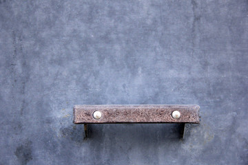 fragment purple door background with focus on the horizontal handle