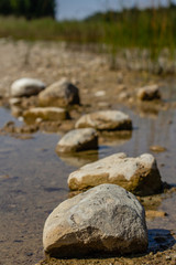 Natural lake stones in water