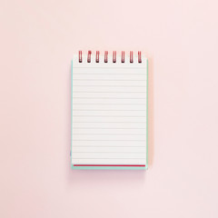open notepad for text over pink background