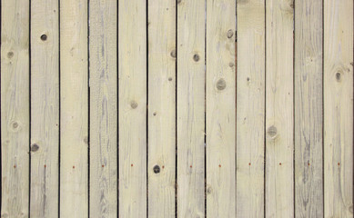 background fence from wooden boards painted gray with white