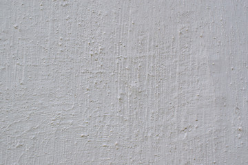 Plastered white wall for backdrop. Color French Gray. Vertical and horizontal stripes, grooves, cracks.