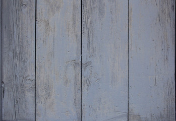 wood panel background with light purple paint