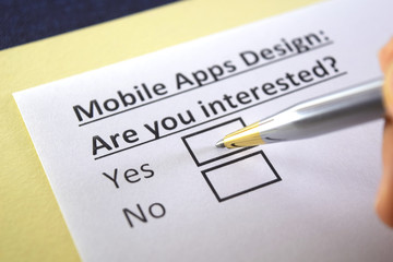 Obraz premium One person is answering question about mobile apps design.