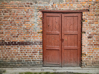 doors on a background of red brick. texture, background.