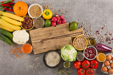 Balanced vegetarian diet organic food background. food for healthy nutrition, superfoods, vegetarian options. vegetables, fruits, greens, cereals