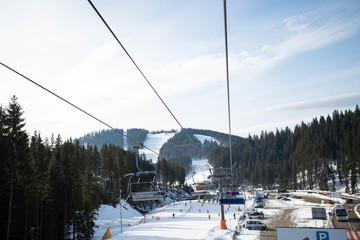 Empty ski-lift in the mountains. End of ski season