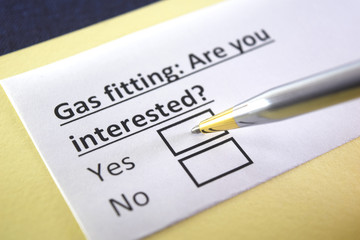 Obraz premium One person is answering question about gas fitting.