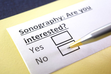 Fototapeta premium One person is answering question about sonography.