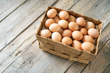 Raw natural chicken eggs in a box.