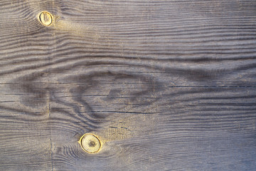 Old wood texture. Board made of old natural wood with knots cracks and scuffs. Beige brown wooden...