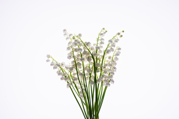 Lilly of the valley flowers and leaves bouquet isolated on white background