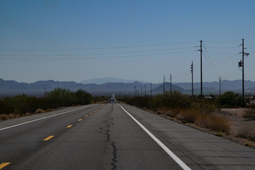 Fototapeta na wymiar Long straid road USA
