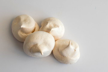 Meringue. sweet meringues. Meringue tray. Close up photo of meringues. Dessert Background.