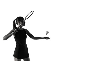 Pretty woman playing badminton over white background