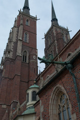 Fototapeta na wymiar Wroclaw Poland, view of the towers of Cathedral of St. John the Baptist on an overcast day