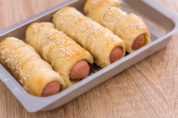 tasty roll sausages baked in dough