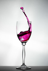 Water splashing out of a glass.