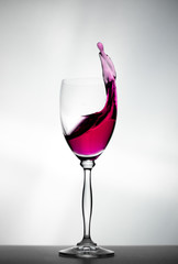 Water splashing out of a glass.